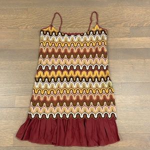 Vintage dress w/pleating at bottom. Straps were altered to make shorter.